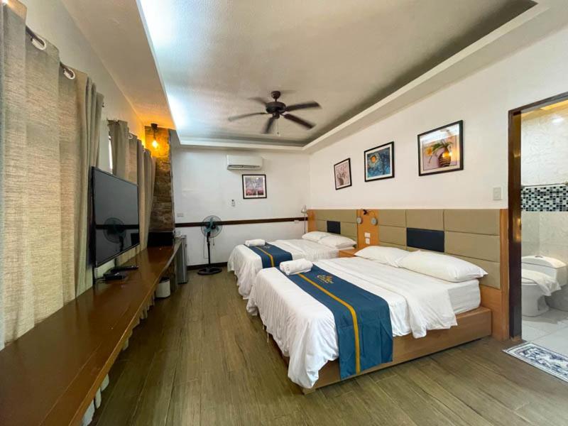 Casa Marco Suites Puerto Galera Powered By Cocotel Exterior photo